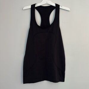Lululemon Black Swiftly Tech Racerback Tank Top 2.0
Hip Length Size 6